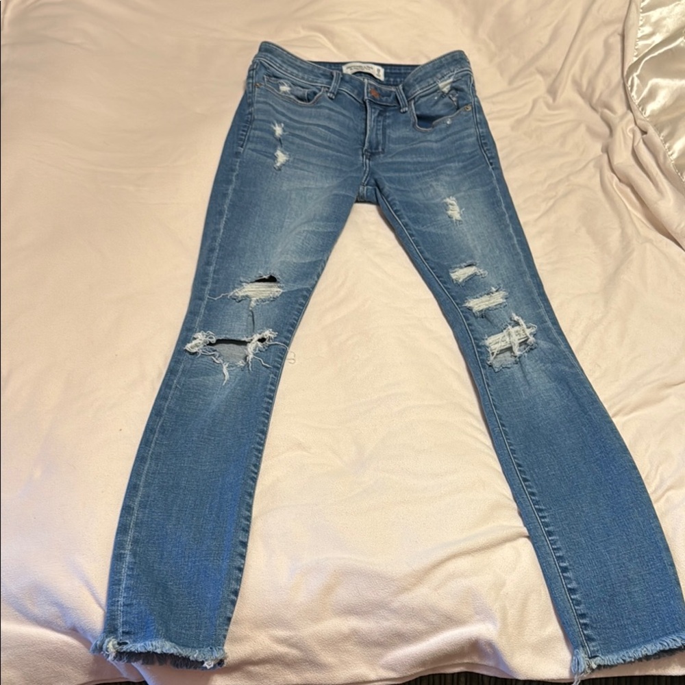 Women's Distressed Blue Jeans